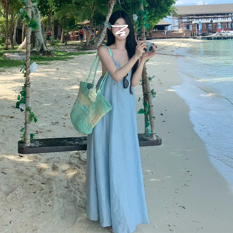 4593气质蓝色吊带露背连衣裙子女2024新款夏海边度假a字仙女长裙