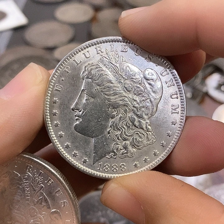 ****银Ag900如图一个银币