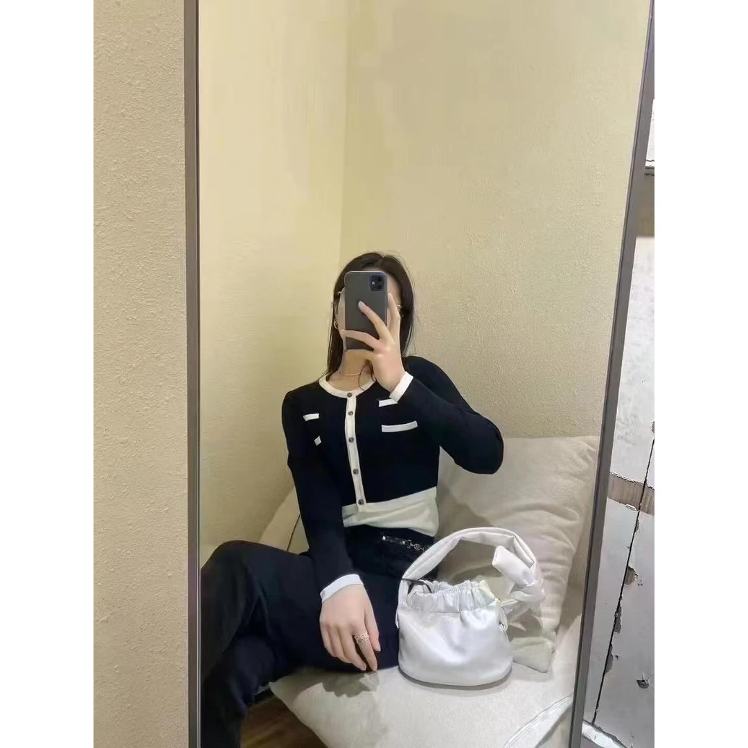 699【0244】【0262】（轻微染色）时尚两件式线开衫EDC1205