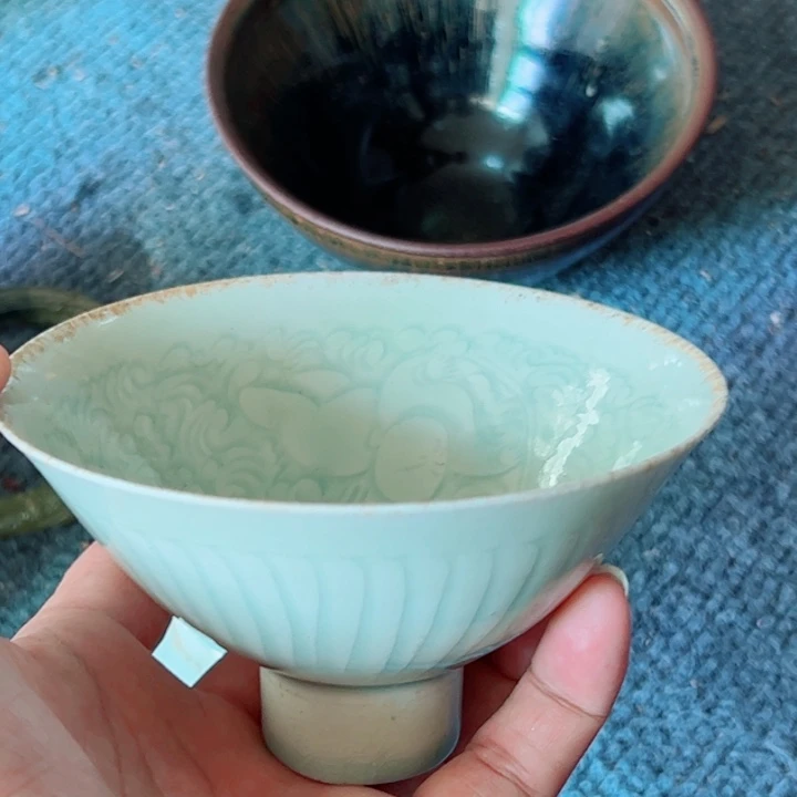 闯***猫瓷片青白釉文饰的一个碗