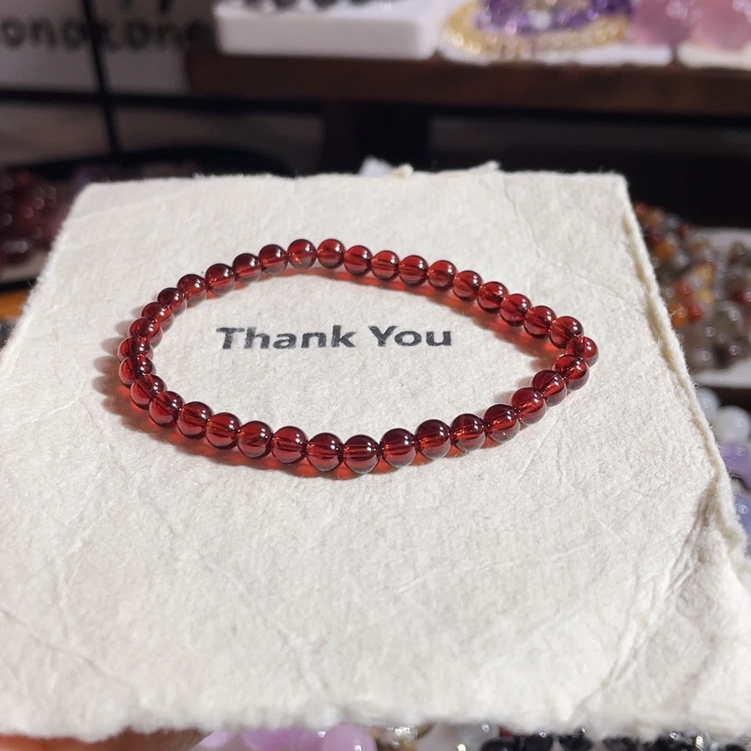 水晶未镶嵌手串香槟粉石榴石