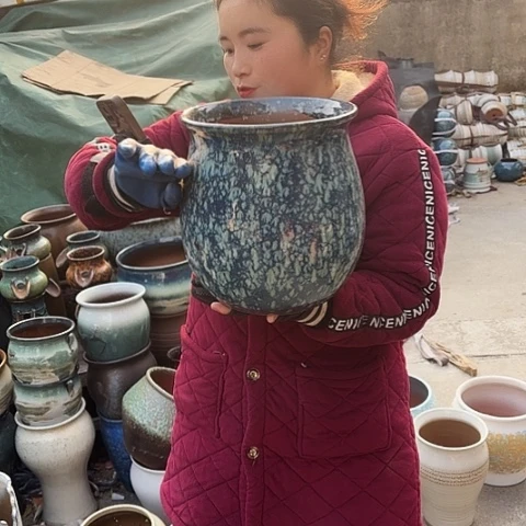 口23高25瑕疵盆子。