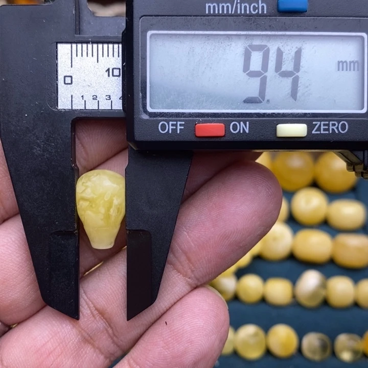 腐***g琥珀未镶嵌裸石3号9.4*9.3*15.6三通