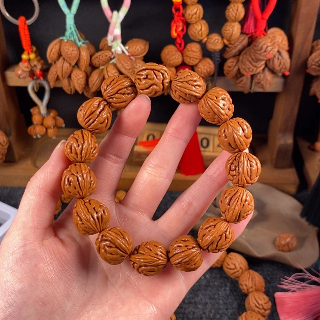 吊坠桃核桃枭手串