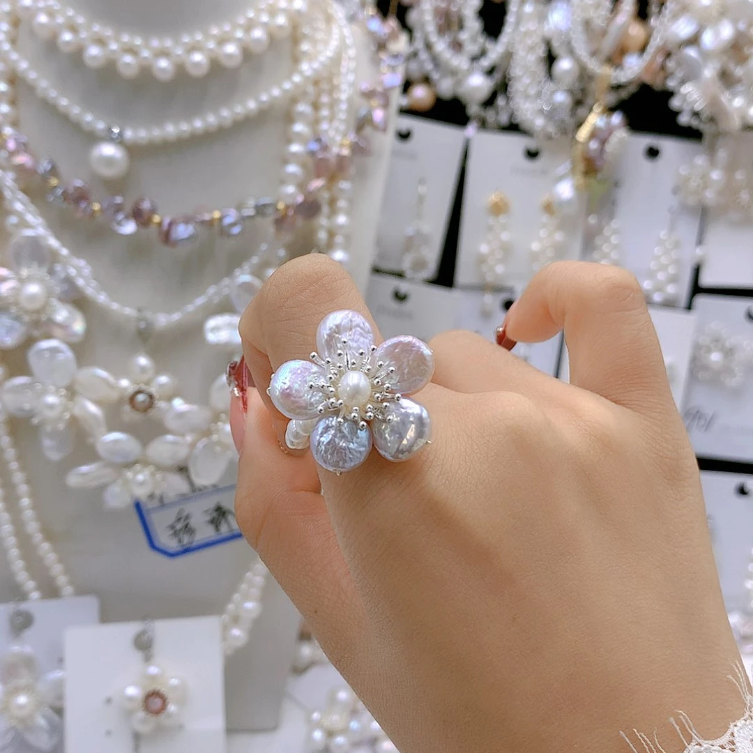 银S925镶嵌耳饰淡水珍珠花****朱