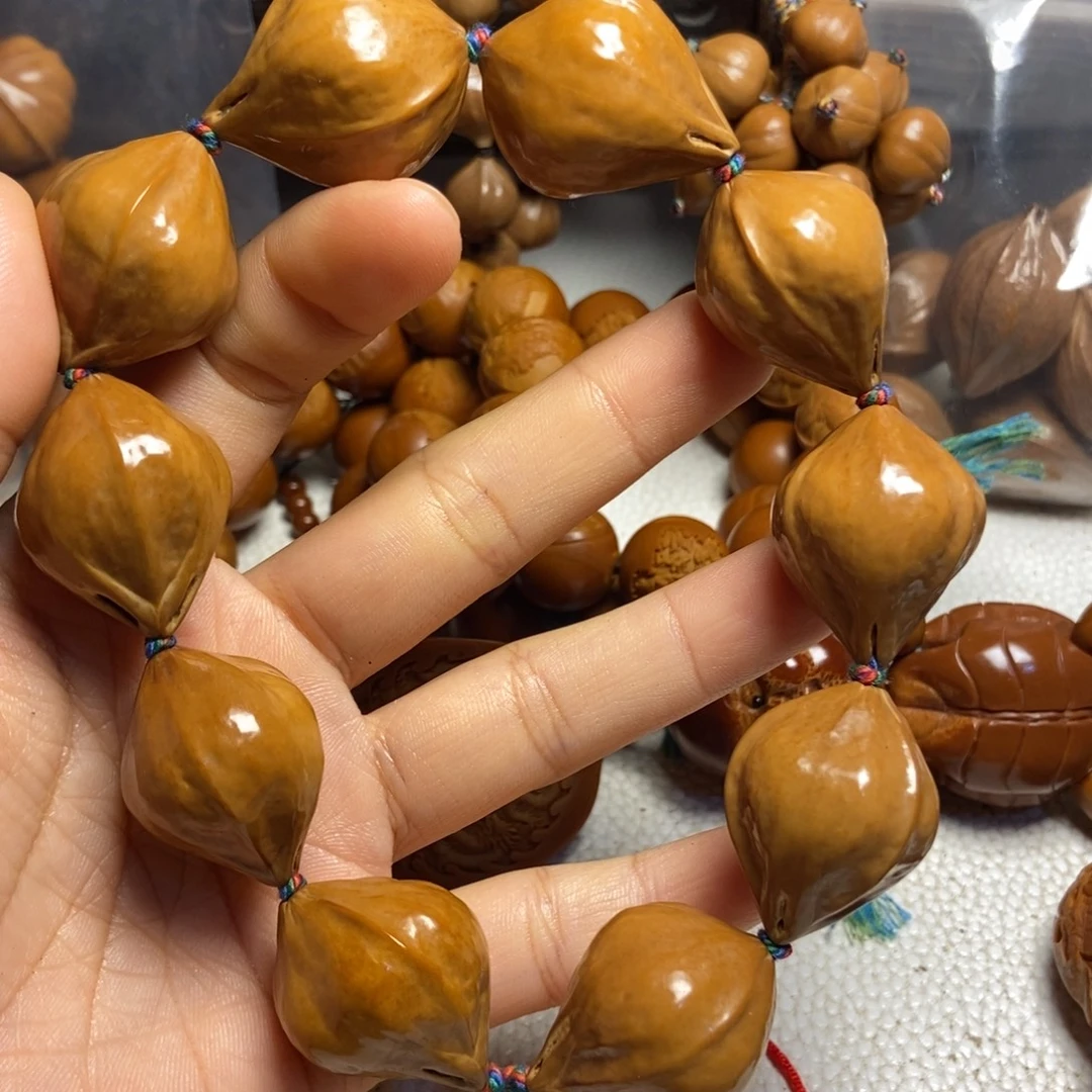 欧***曼橄榄核手串/手链包衣大素核