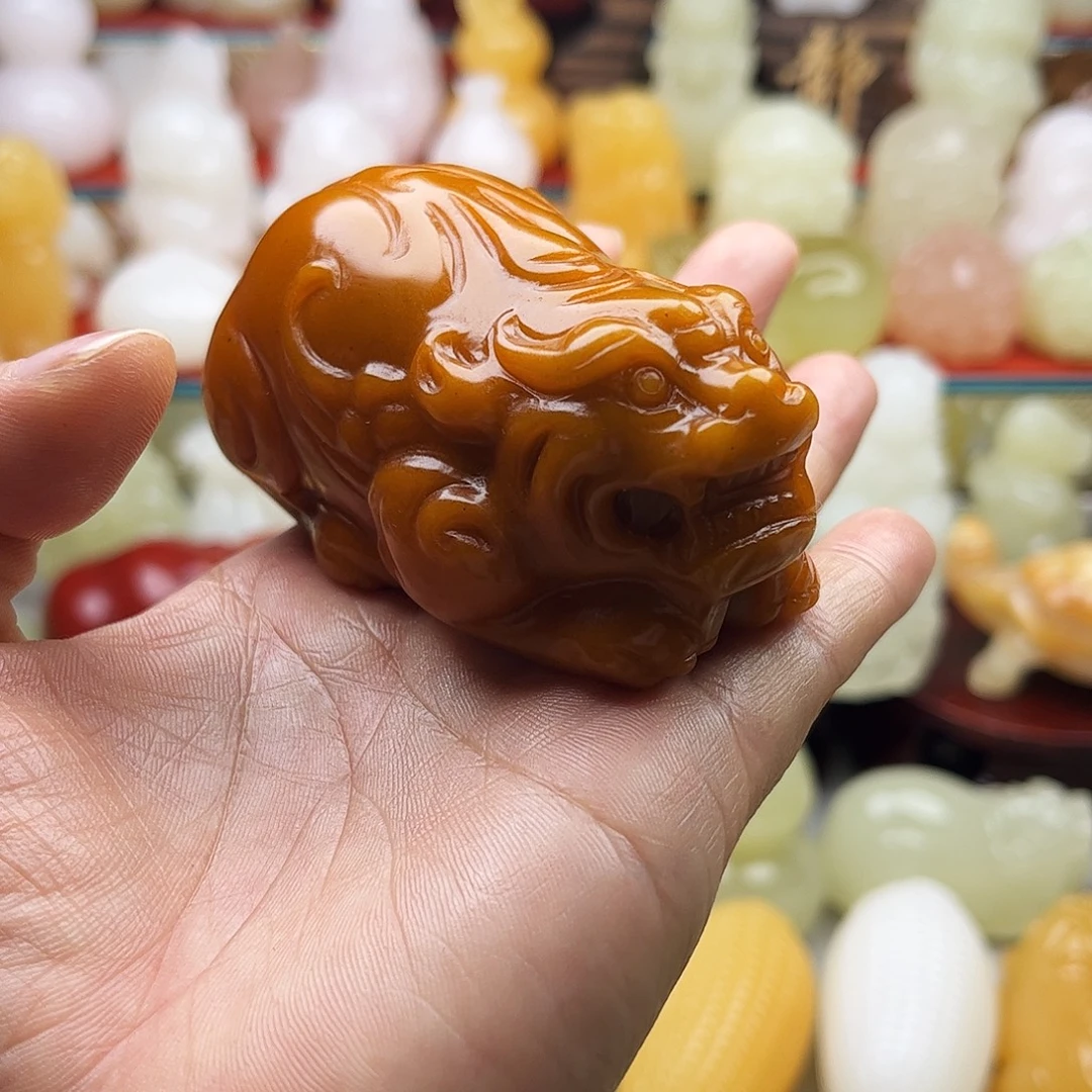 土***子石材貔貅手把摆件