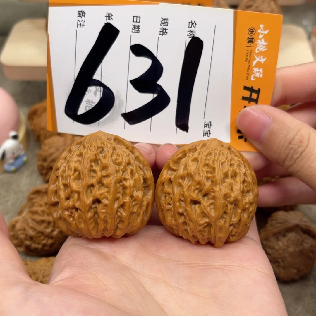 文玩核桃把件38金牛