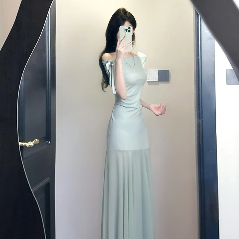 法式绿色露肩网纱连衣裙子女装夏季2025新款气质绝美收腰包臀长裙