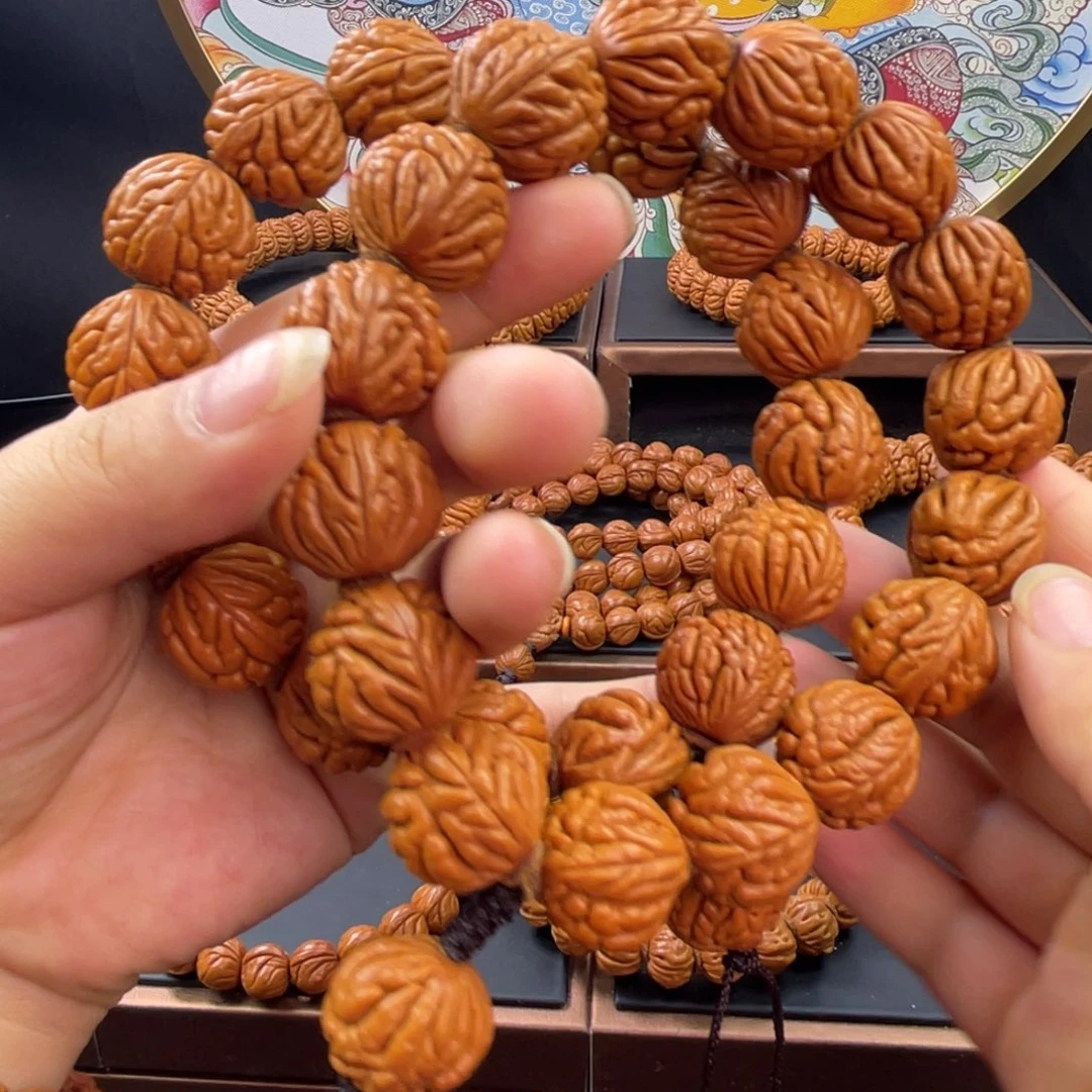 三***朵桃核吊坠龙纹桃核豹子头