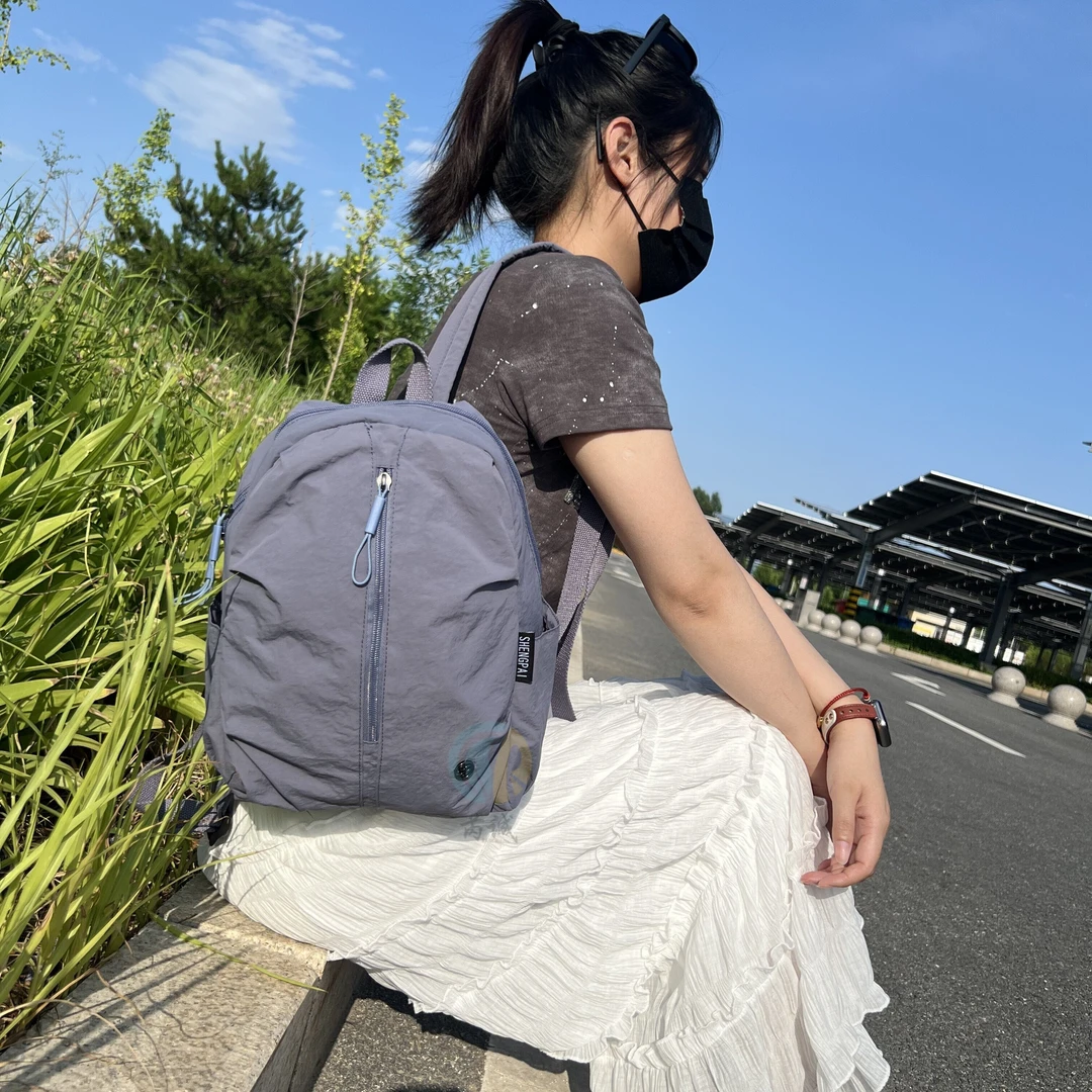 降落伞轻面料双肩包女2025时尚防泼水书包大容量双肩女士潮流背包