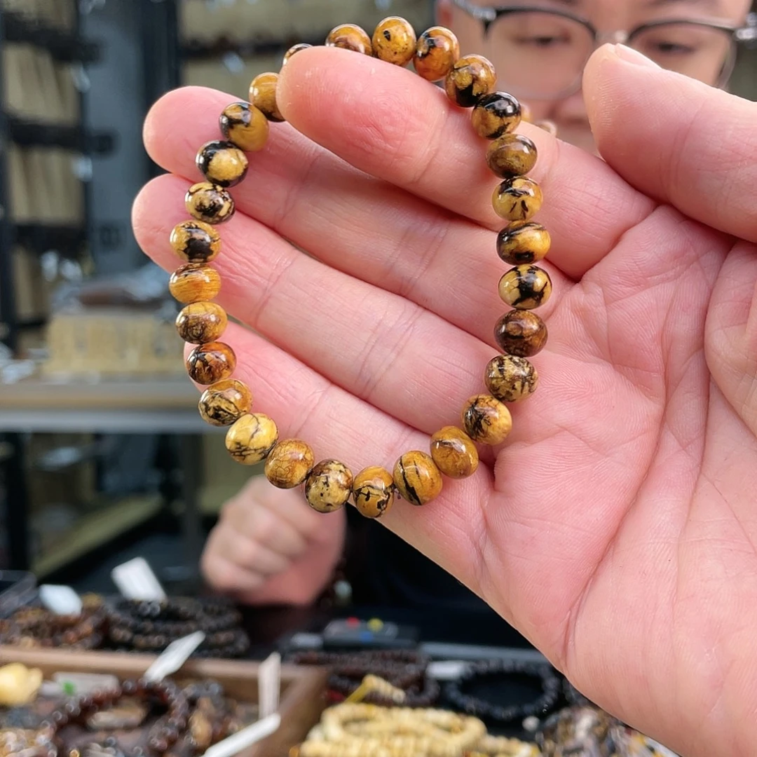 米***沐琥珀未镶嵌裸石8花蜡单圈