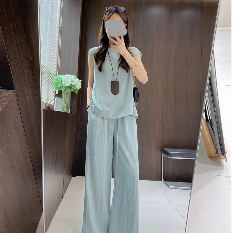 松弛感穿搭套装2026新款女装夏季高级感蓝色无袖上衣阔腿裤两件套