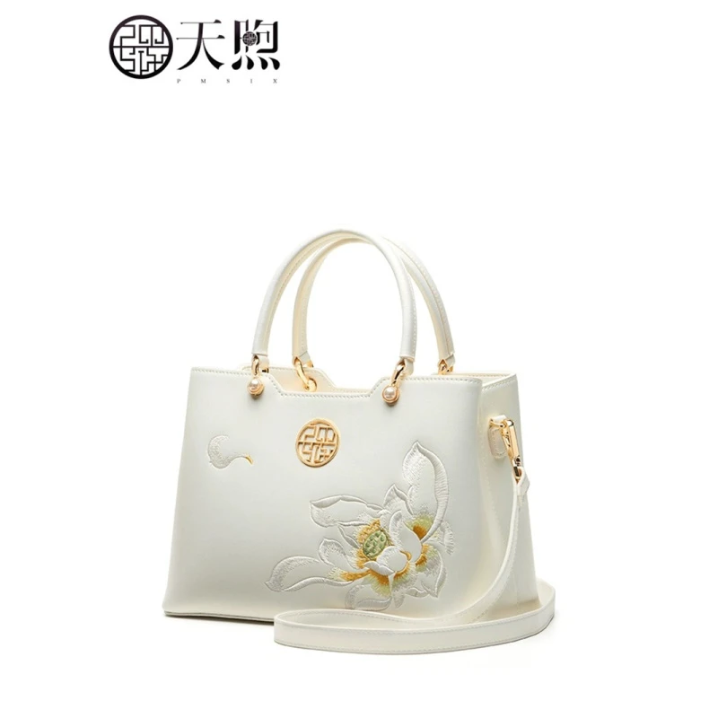 珠光牛皮莲花刺绣手拎包P120279