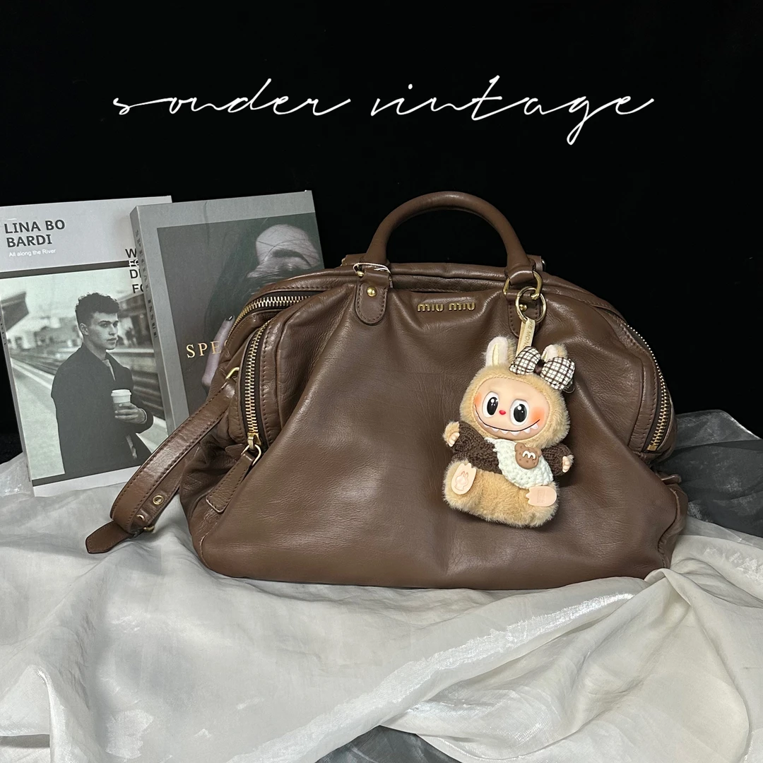 95新 MIU MIU/缪缪 miumiu缪缪手拿斜挎包