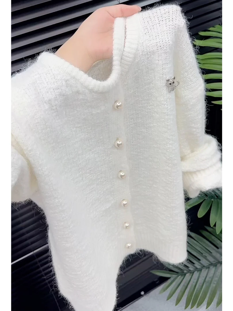 时尚圆领温柔风针织开衫女2025秋季新款宽松显瘦百搭纽扣毛衣外套