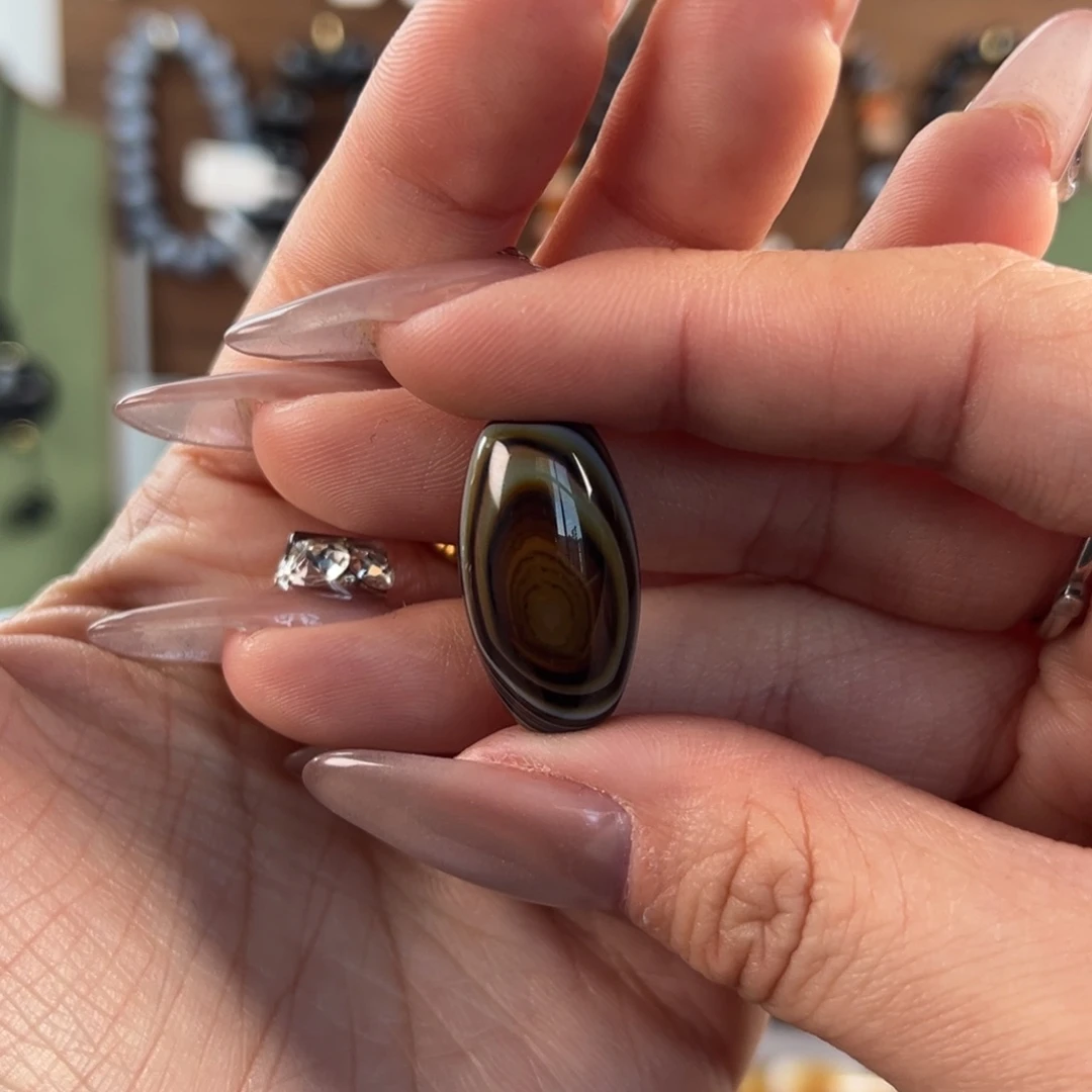 弓***吖玛瑙/玉髓合金珠宝奇石