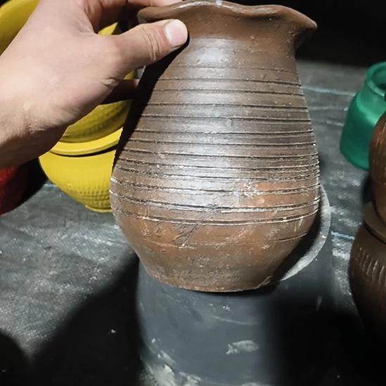 古铜色白菜口径12高度18底部有孔