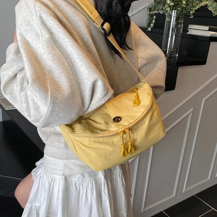 春季休闲运动马鞍包女包2025新款学生大容量百搭帆布包通勤斜挎包