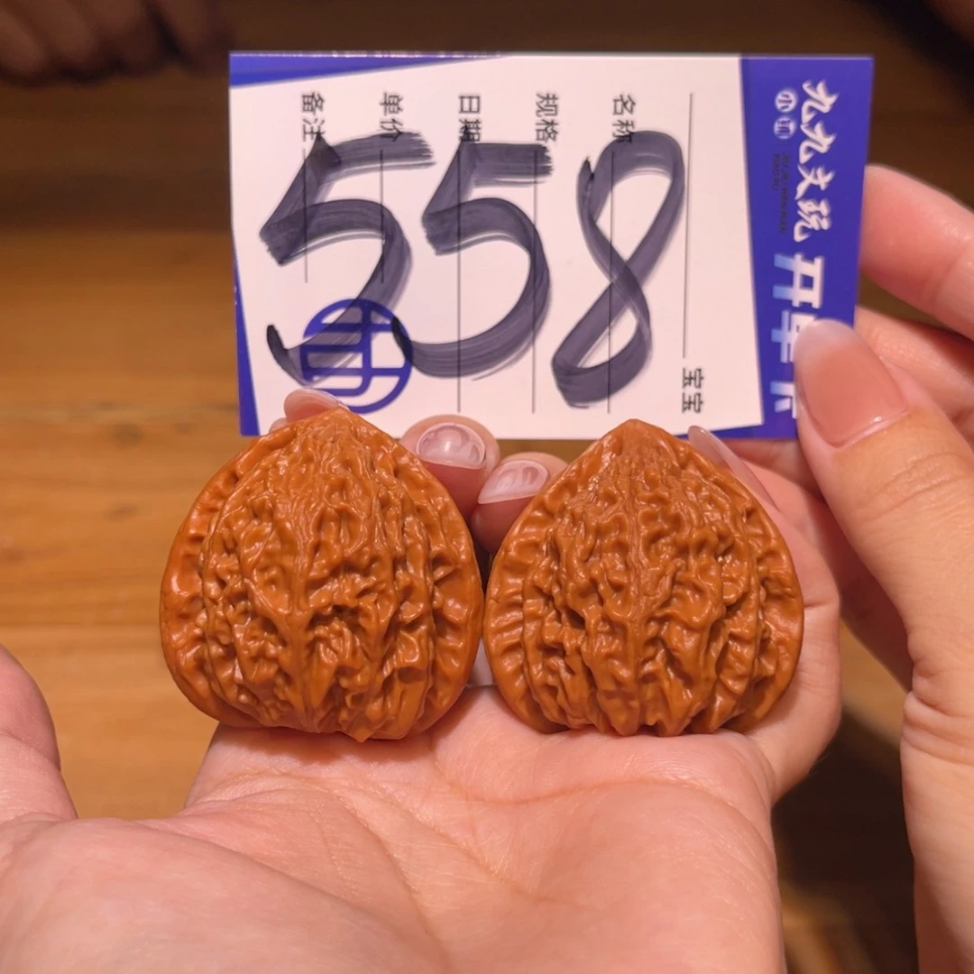 文玩核桃把件40金牛