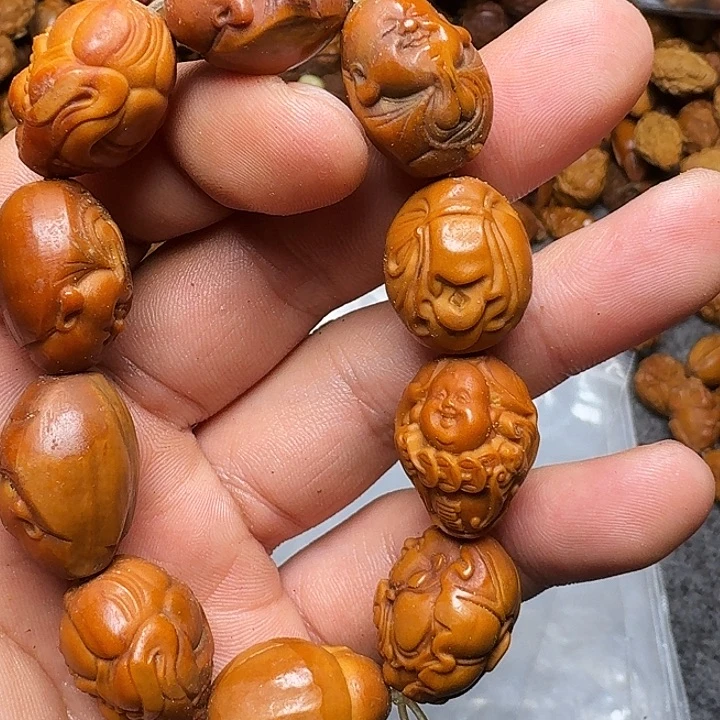 橄榄核手串呦*✓你是谁