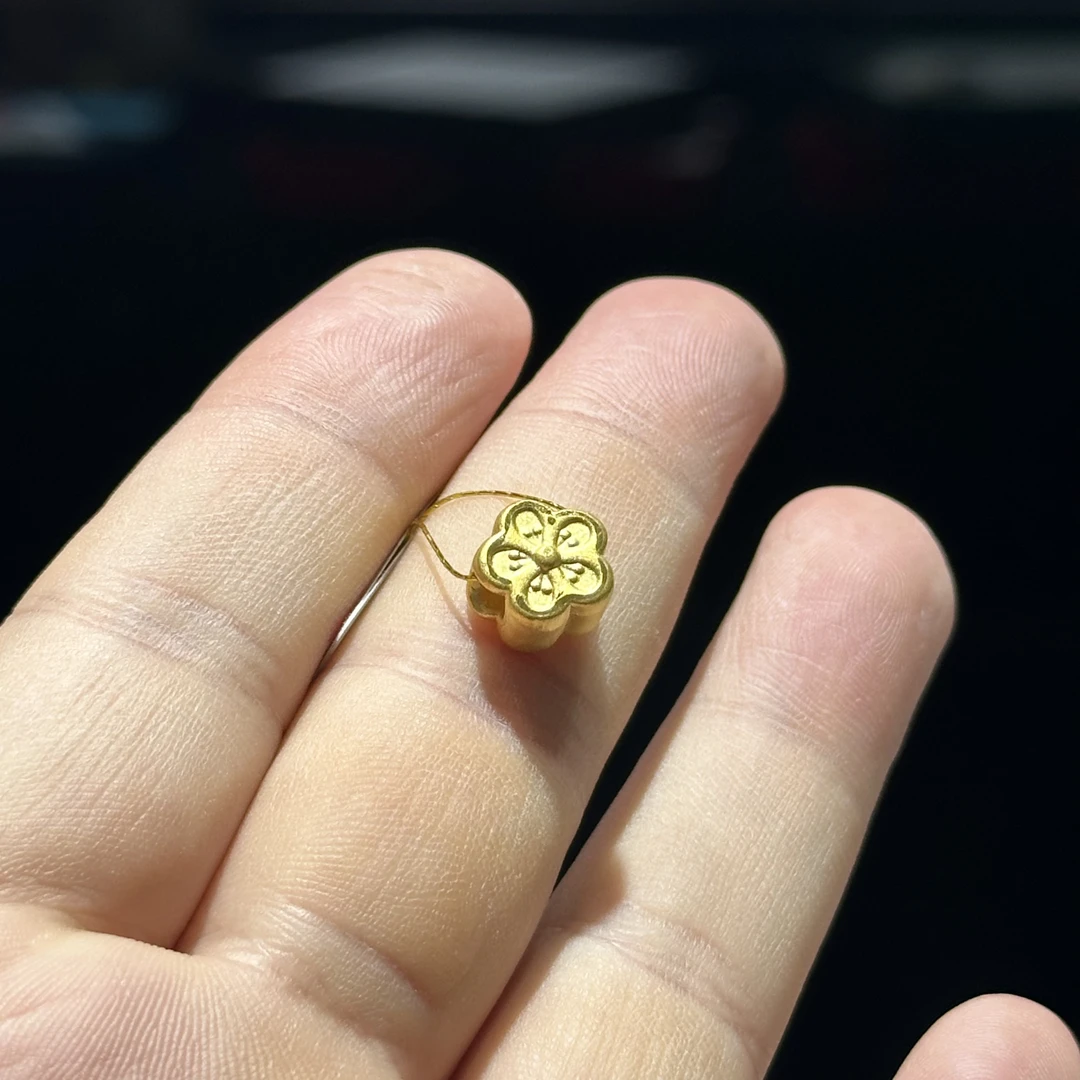 足金999 桃花通孔 0.771
