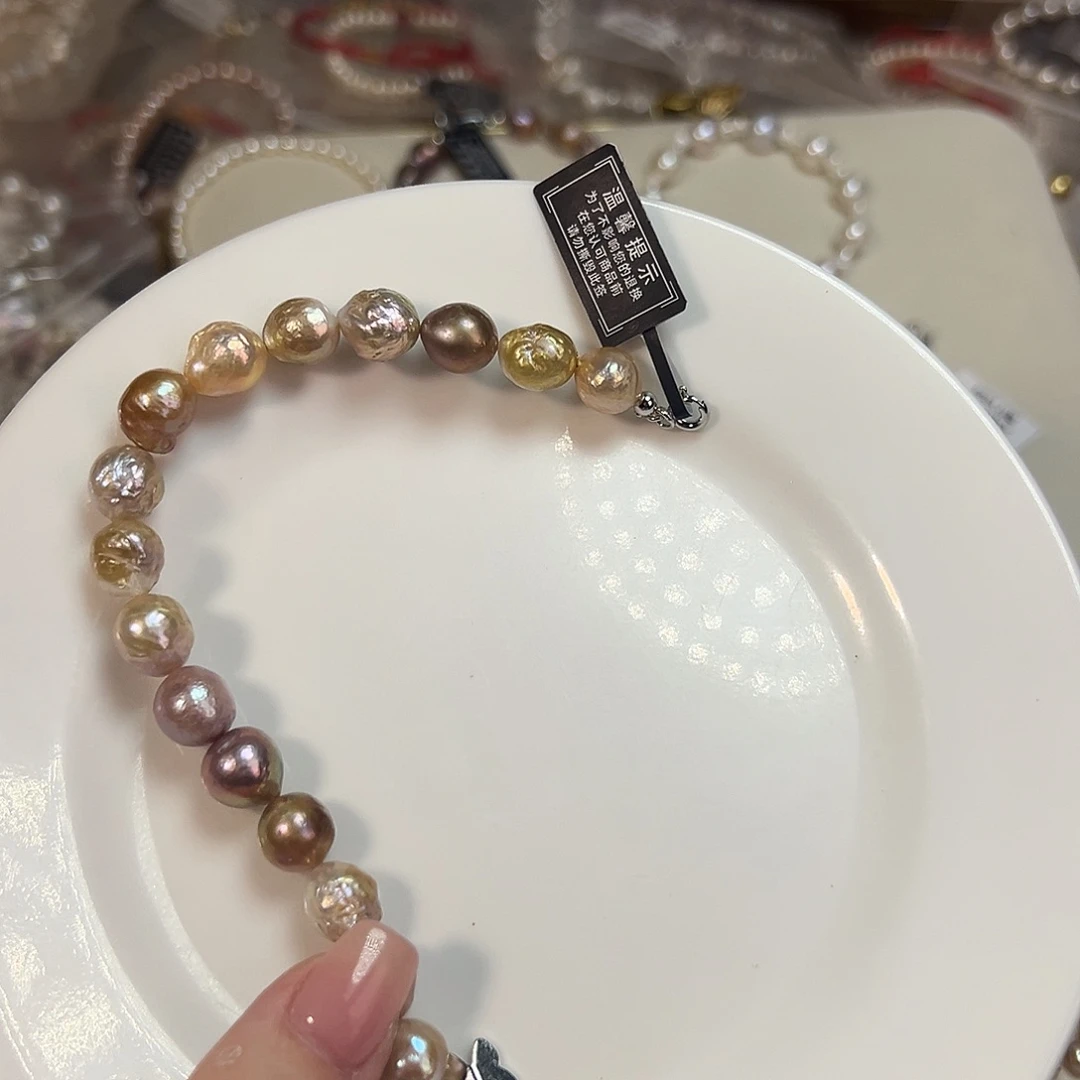 莉***莉时尚设计款淡水珍珠淡水珍珠银S925镶嵌