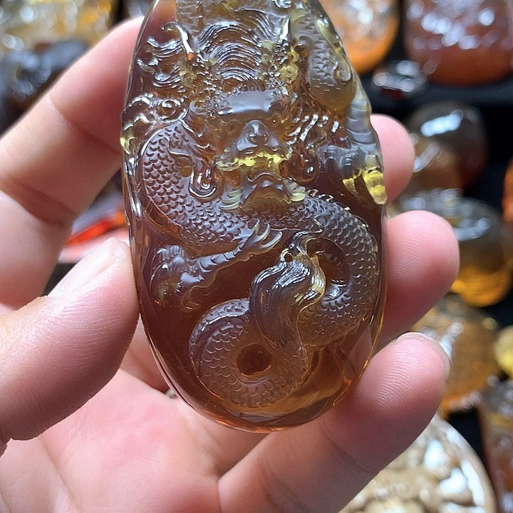用***7裸石琥珀未镶嵌紫绿双色茶龙牌