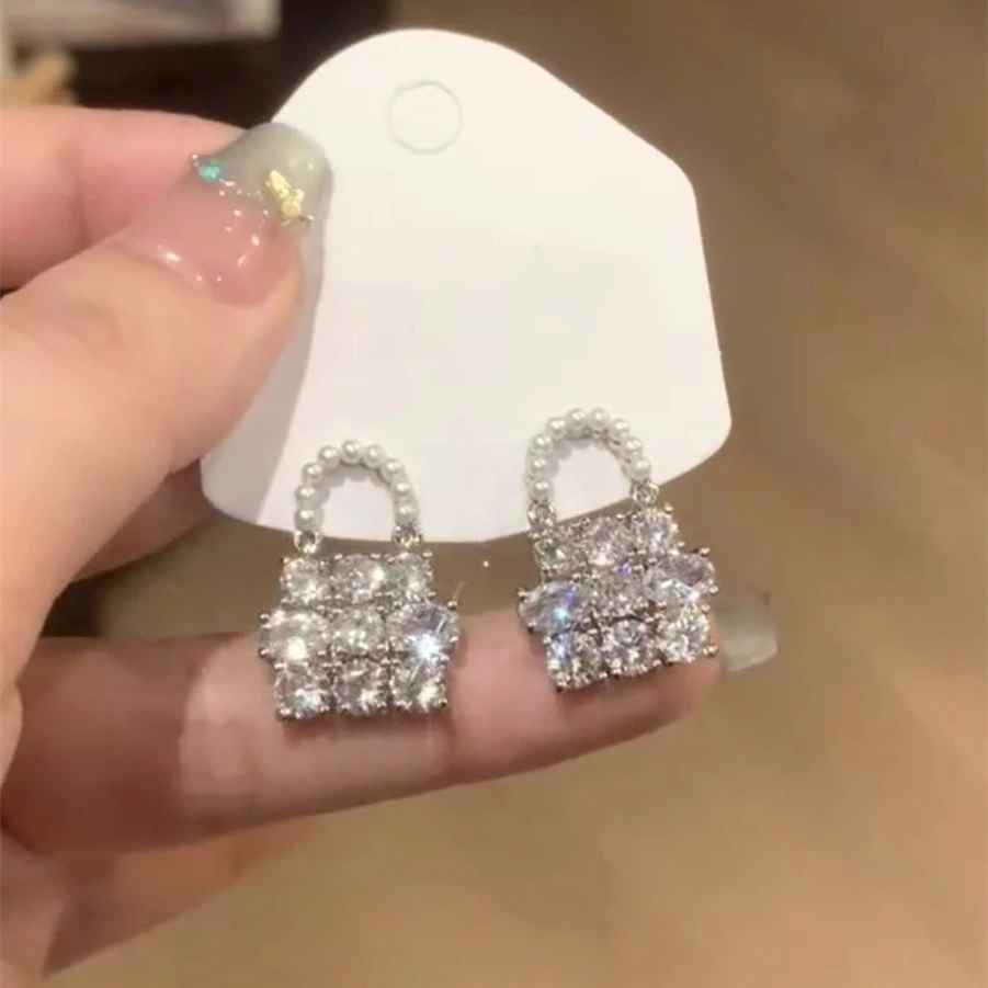 铜合金耳饰  银色满钻包包耳钉女轻奢高级感气质大气耳环精致耳饰