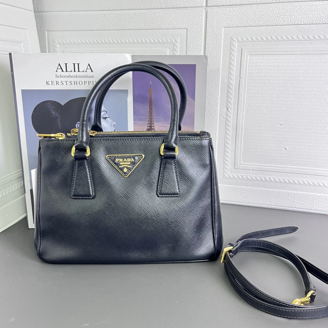 95新 Prada/普拉达 黑金杀手（在售款）底长25手提斜挎包