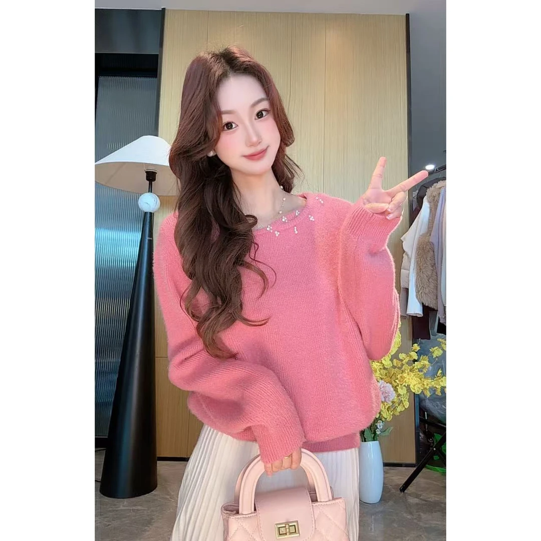 不起球 独特好看的斜镂空钉珠圆领气质针织衫加厚毛衣女