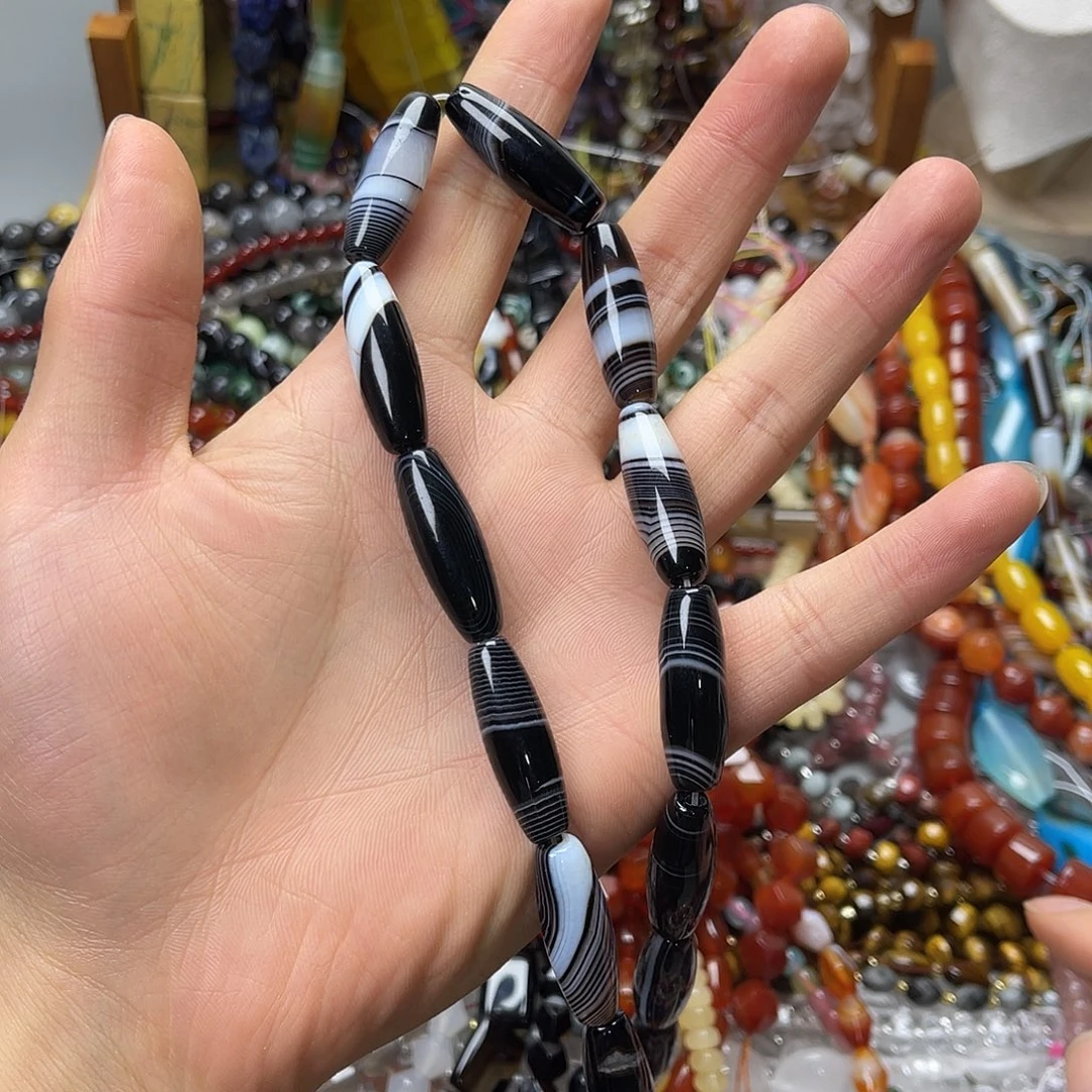 玛瑙/玉髓未镶嵌珠宝半成品10×30黑蚕丝玛天珠一条