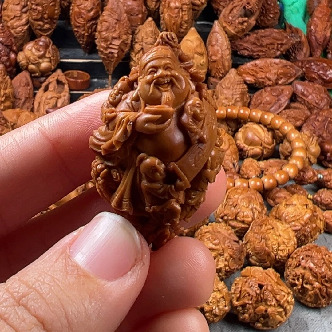 淡***晴橄榄核手串/手链核雕