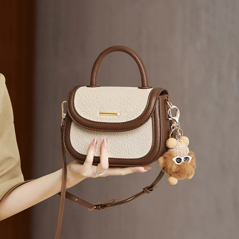 包包夏季女斜挎2025新款高级感手提包真皮个性撞色百搭马鞍包bags