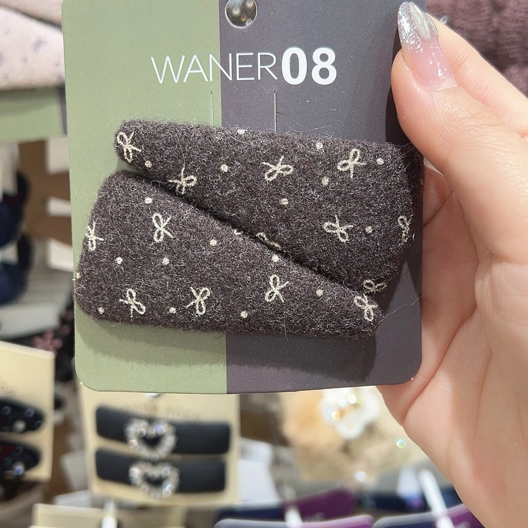 皮质铁合金咖色蝴蝶结三角掰掰夹