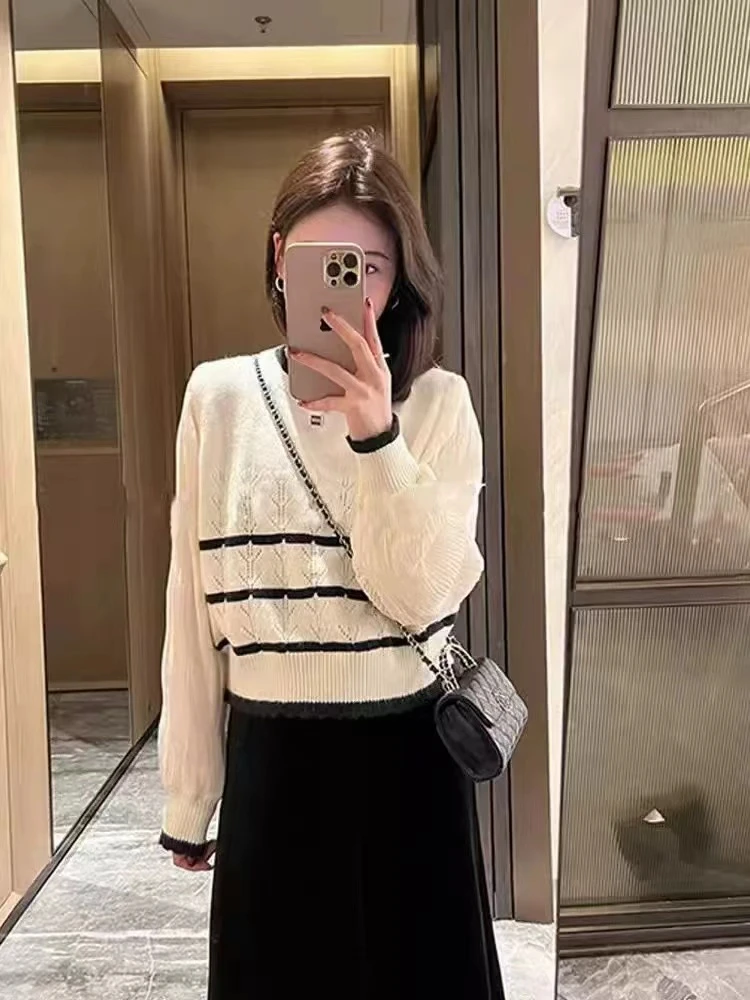 2025春季新款韩版假两件条纹针织衫女时尚设计感短款内搭显瘦上衣