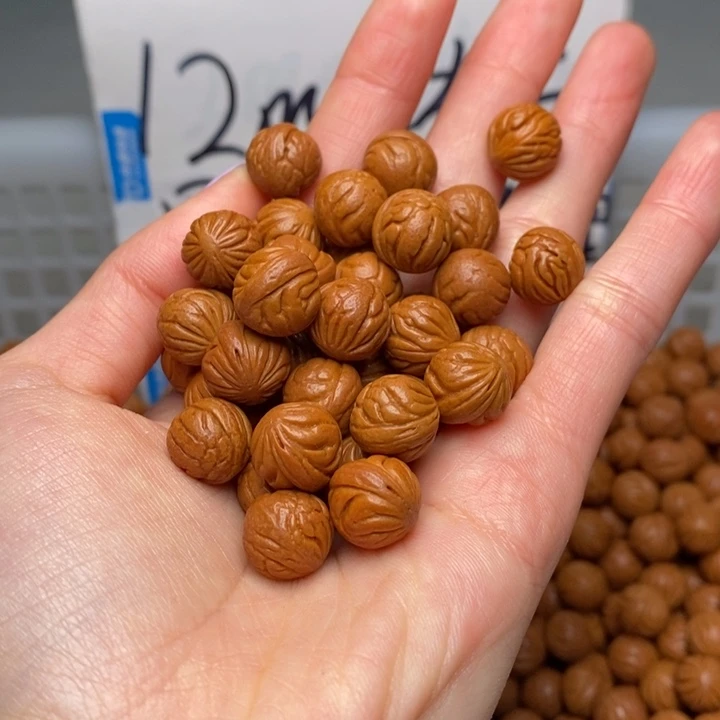 我***日桃核手串12mm左右野生红锦鲤27颗（打孔）