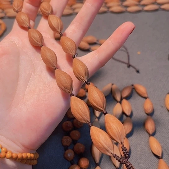 橄榄核手串/手链东****店1.2小瓜子手持