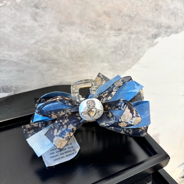 爱心地球蝴蝶结抓夹FJ1389