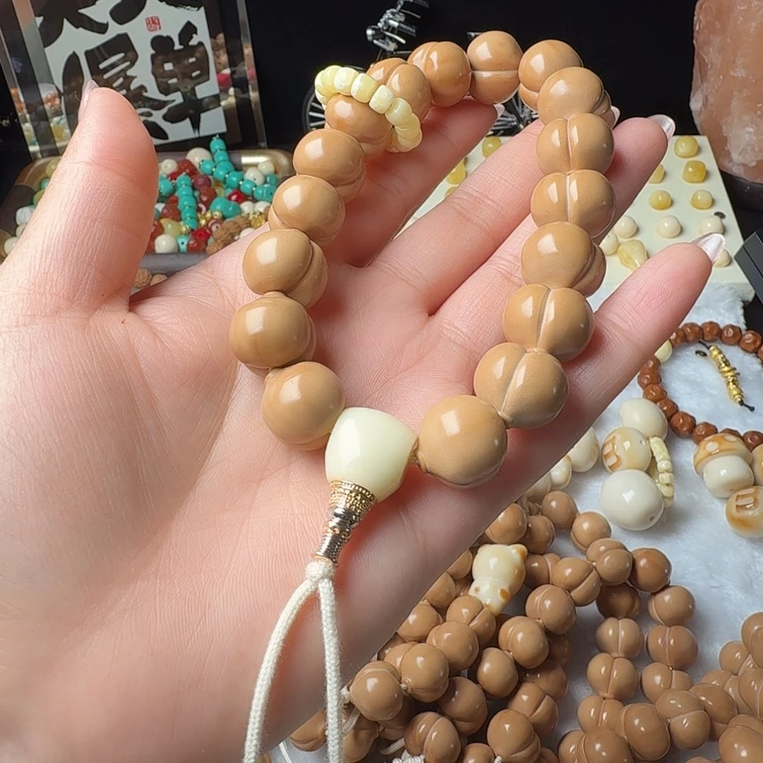 哈***饰猴头核桃手串屁桃