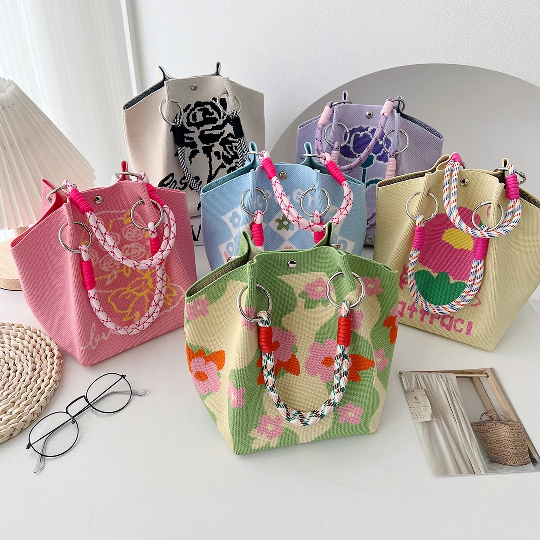 春夏新款包包ins花朵针织手提包时尚出游休闲手拎包水桶包大容量
