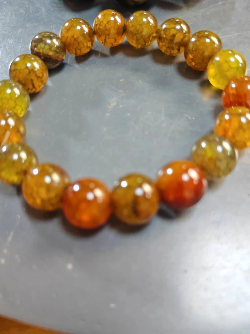 泗水砭石文化馆麒麟凤血串手把件茶卡10