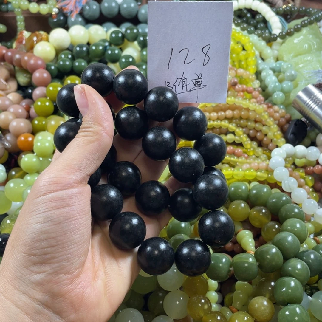 大***海未镶嵌蛇纹石玉手串