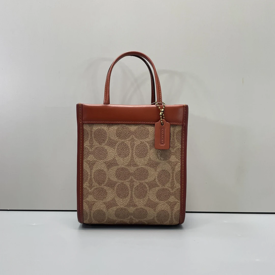 95新 COACH/蔻驰 小林/红棕老花琴谱包14*16*6cmA092507