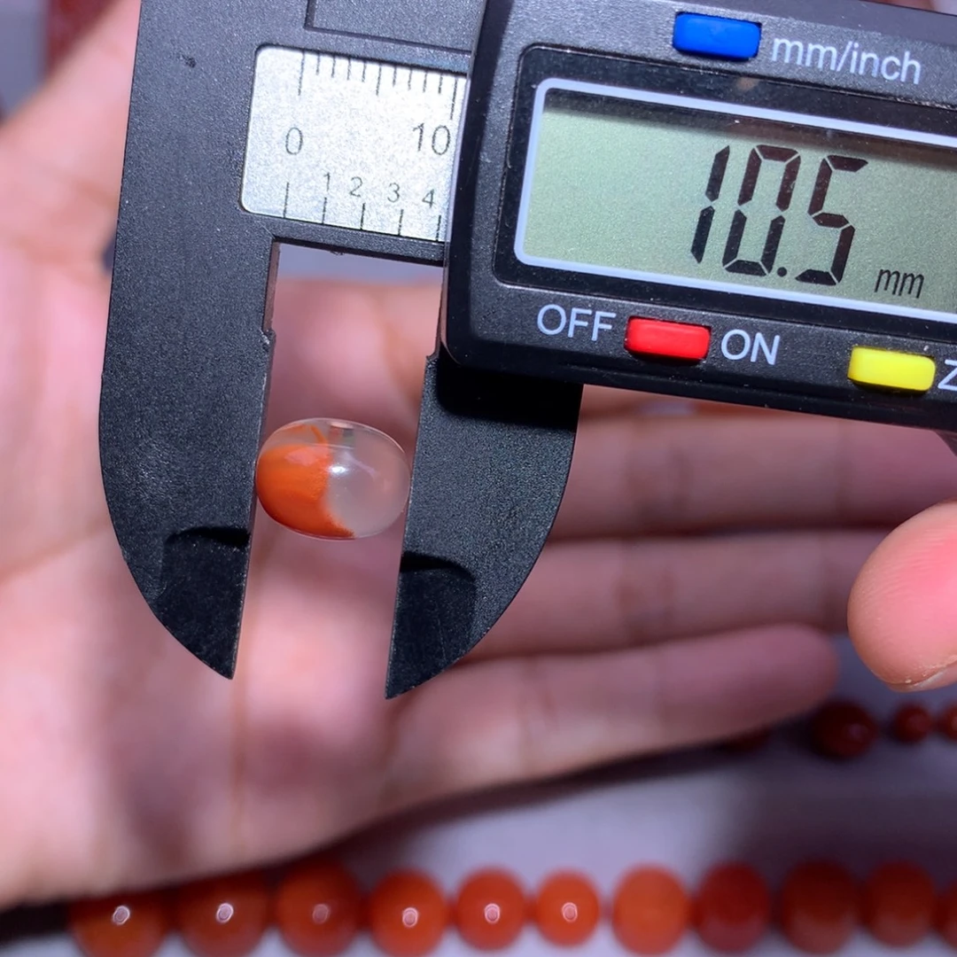 南红玛瑙未镶嵌冰飘隔珠10.6×7.7孔面微裂不明显