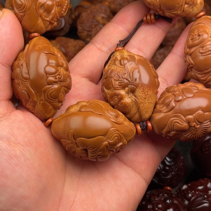 百***钢橄榄核吊坠橄榄核