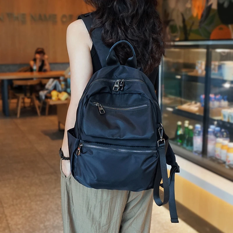 新款时尚大容量简约轻便双肩包女包2025高级感黑色百搭背包旅行包