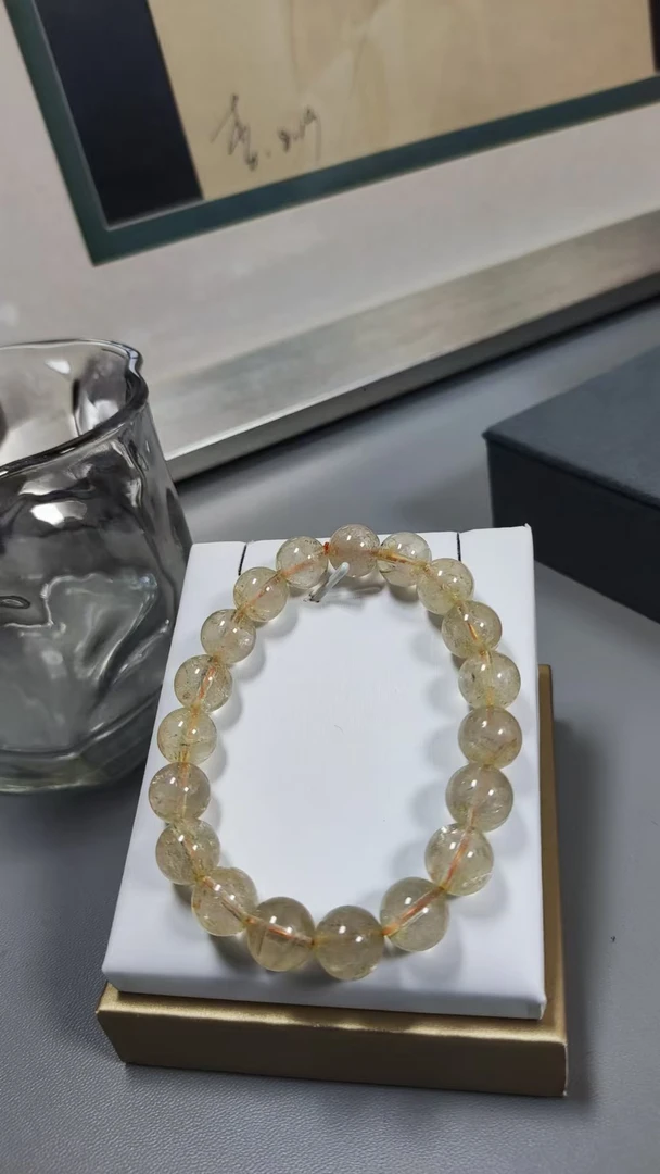 黄发晶素串水晶手串