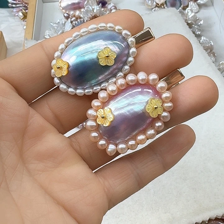银S925镶嵌淡水珍珠发饰蒲**?