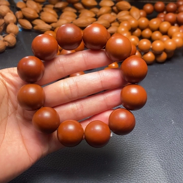 吊坠橄榄核1.9尺寸树王鸡血红光珠全品